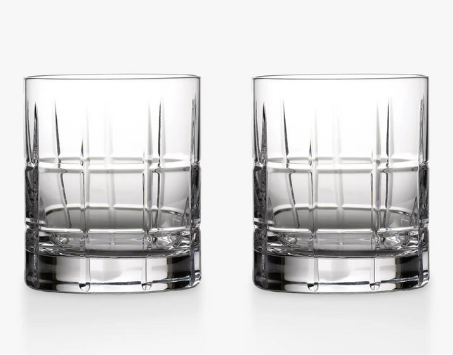 Two clear cut-crystal whiskey glasses with a grid pattern, shown side-by-side on a clean white background.